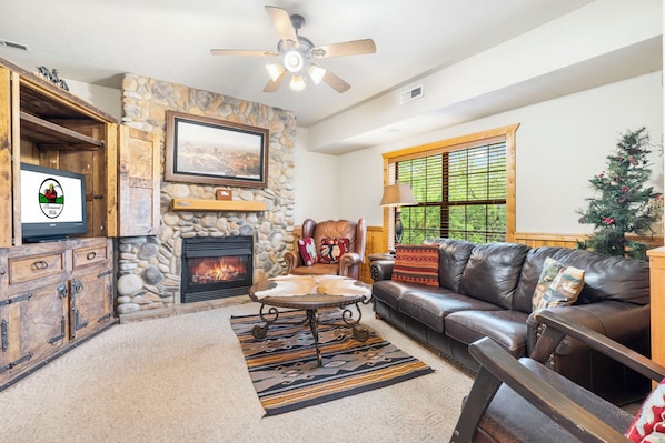 The Living Room features a Gas Fireplace, Cable TV/DVD, and a Sofa Bed