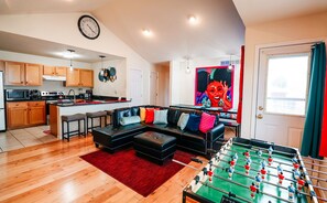 Step into relaxation and entertainment central! From the moment you walk through the door, our living room and kitchen combo invites you to unwind and play. Your perfect retreat awaits. 🚪🛋️🍽️ #WelcomeHome #UltimateHangout