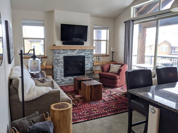 Comfy living room with vaulted ceilings and great views!