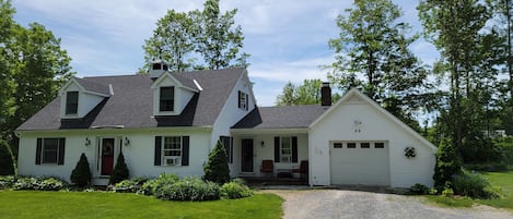 In warm months the house and perimeter are surrounded with over 1000 plants.