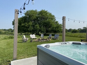 Hot tub, patio and fire ring