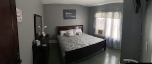 Cali King Bed with 32” Smart TV, Charging lamp and Google Home in every room. 