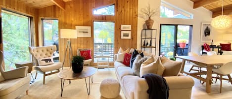 Open plan living room with vaulted ceiling and amazing mountain views