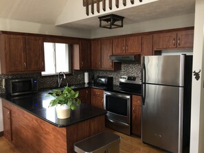 Kitchen - Open to Dining Table and 2nd Floor Family Room