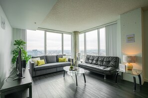 Flooring, Couch, Furniture, Living Room, Indoors