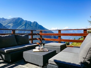 Blue, Sky, Furniture, Property, Room, Mountain, Patio, Roof, Building, House