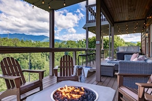 Lower level deck with fire pit, hot tub and outdoor games!