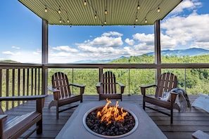 Lower level deck with an incredible gas fire pit!
