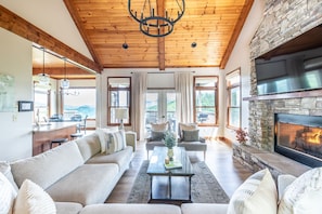 Living area with indoor fireplace and plenty of seating for everyone!