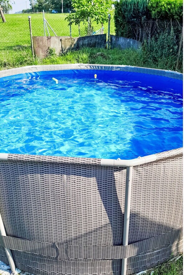 Water, Plant, Property, Swimming Pool, Blue, Azure, Chair, Grass, Rectangle, Outdoor Furniture