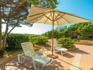 Plant, Sky, Property, Plant Community, Umbrella, Botany, Nature, Shade, Outdoor Furniture, Tree