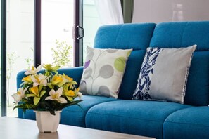 Ground floor living area with TV (Air conditioned)