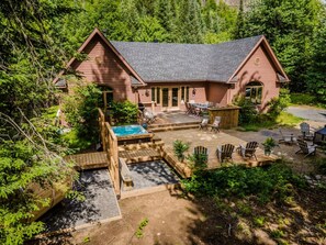 House surrounded by lush trees—perfect for a peaceful escape and reconnecting with nature.