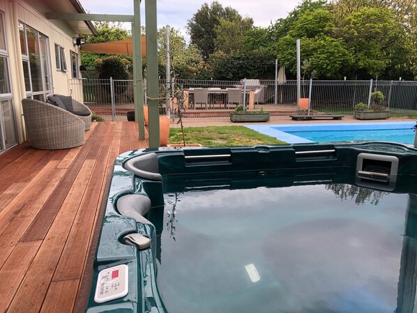 Spa on the deck overlooking the pool
