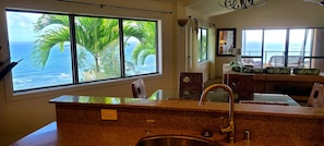 Full ocean front views on all three walls of living room/Kitchen