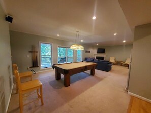 Pool Table in downstairs family room. Dart board, screened in porch, dartboard, TV