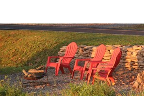 Lakefront w/4 chairs and a firepit. Firewood's free as long as it lasts!