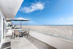 The front patio looks out onto the boardwalk and beach for the best view in town!