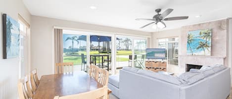 Sliding doors open from the living room to invite in that fresh ocean air, making indoor/outdoor living a breeze!