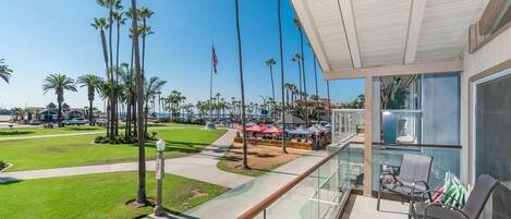 Expansive view from the upstairs patio: Balboa Pier area, local restaurants, and ocean beyond!