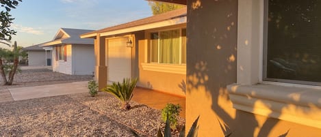 Clean house with a fresh stucco job.