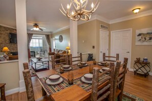 Rustic Log Dining Chairs, and Antler Chandelier!