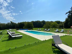 Sun loungers around the swimming pool