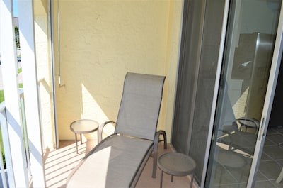 Charming Marco Condo, Directly across from Public beach access and JW Hotel!