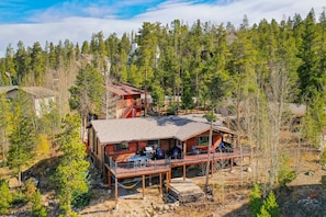 Aerial view of the back deck running the length of the house.