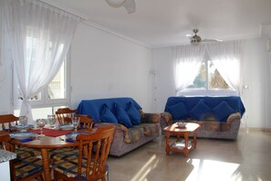 Living room and dining area of the apartment in Villamartin