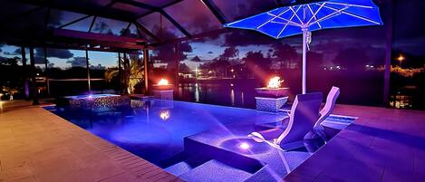 Pool, with fire bowls & ledge lounger furniture, with pool cooler & unbrellla