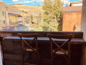 Relax and unwind on the balcony with beautiful views of Vail!