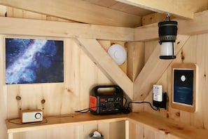 Wifi, solar powered battery station, bluetooth radio, lantern lighting.