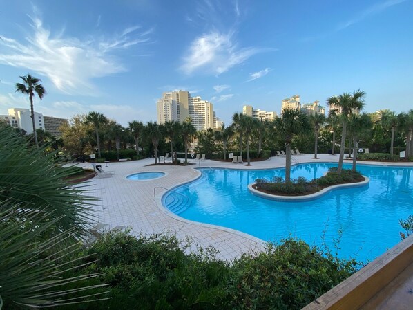 Kids pool, large pool, and a hot tub!