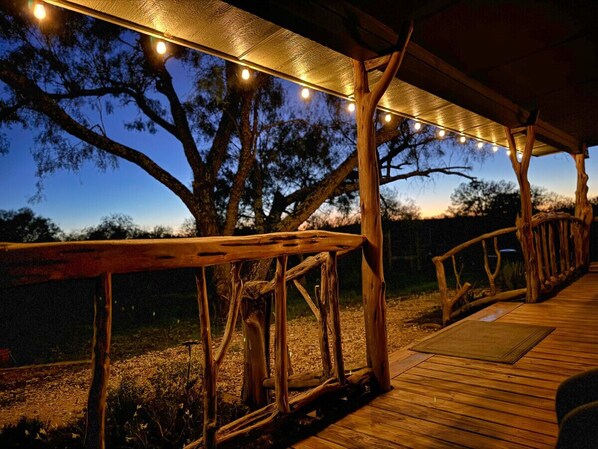 Porch at dusk, looking west--front-row-seat for sunsets.