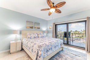 Master bedroom with ocean views and king bed