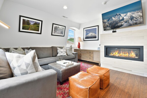 Light-filled living room with comfortable furnishings.