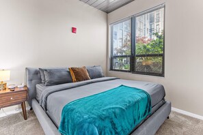 Main bedroom has comfortable king sized bed