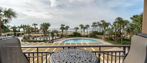 View of the beach and pool from the balcony