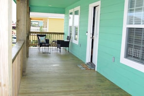 Porch overlooking canal. Enjoy sunrises, morning coffee, sunsets and sundowners.