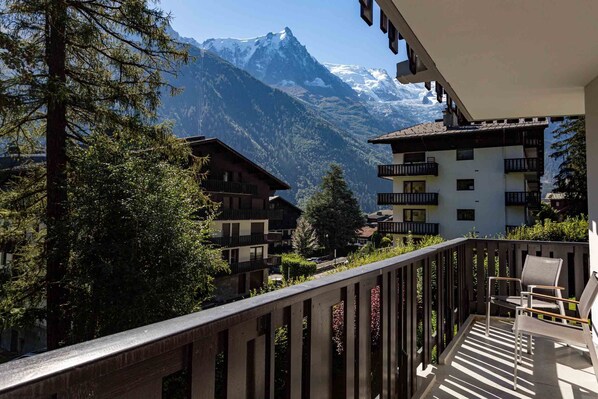 Large balcony with mountain views