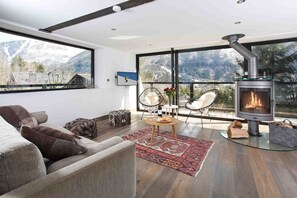 Sunny living room with log fire