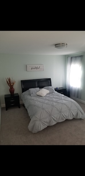 master bedroom with queen size bed