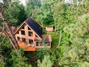 Deer Lake Chalet and its bank of windows overlooking the lake.