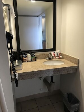 Full bathroom with a shower. Basic toiletries and towels are provided