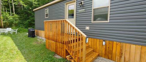 Front of cottage and lot. Backs onto wooded area for a true cottage experience