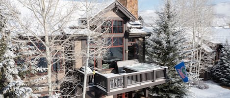 Balcony with hot tub over looking ski slopes