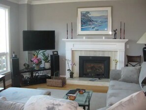 Watch all your favorite movies while relaxing in front of the gas fireplace.