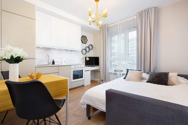 Living room with a comfortable sofa and TV.