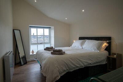 Two separate 2-bedroom apartments, joined by a private hallway. Kendal Town Centre
